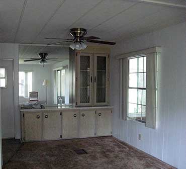 Southern Comfort Home Improvements and Maintenance updated this 70s kitchen with new cabinets