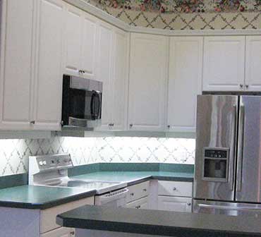 Southern Comfort Home Improvements and Maintenance updated this kitchen with new cabinets