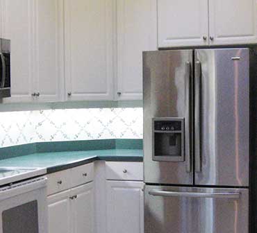 Southern Comfort Home Improvements and Maintenance updated this kitchen with new cabinets